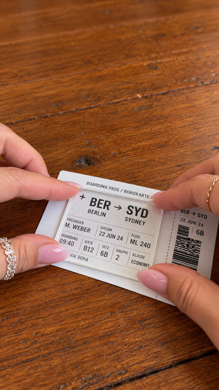 Pressing the acrylic onto a boarding pass